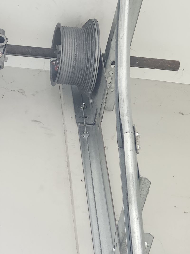 Cable drum and track after a cable reset in Argyle, TX