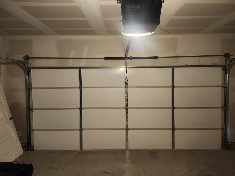 Inside view of a new double garage door with opener in Aubrey, TX