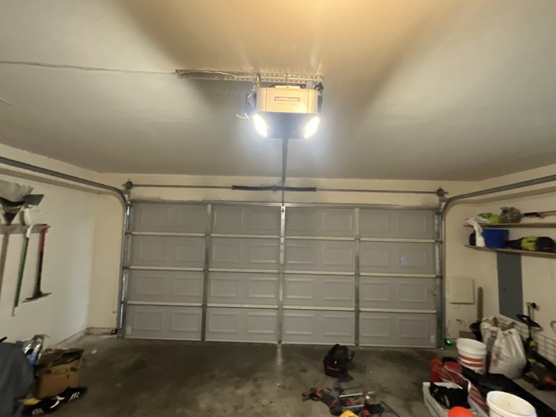 New garage door opener installed above a double door in Caddo Mills, TX