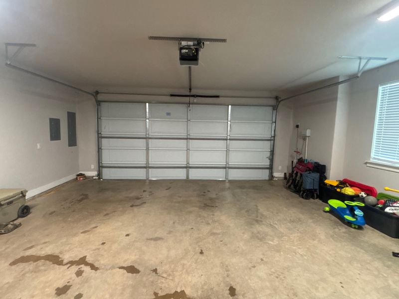Inside view of a double garage door after a balance adjustment in Caddo Mills, TX