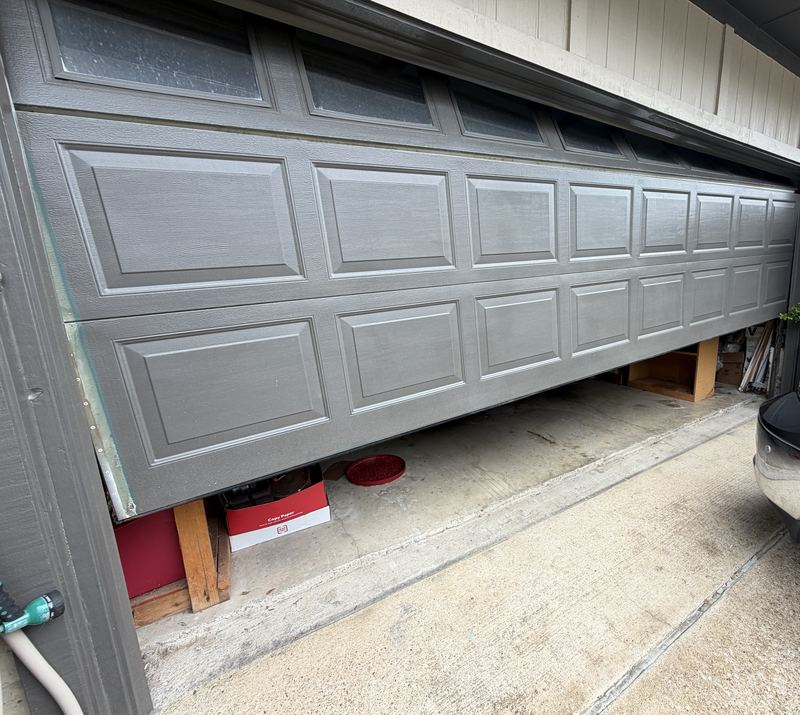 Before: door off its track in Plano, TX