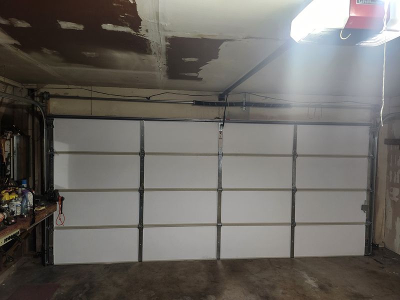 New double door seen from inside the garage in Everman, TX