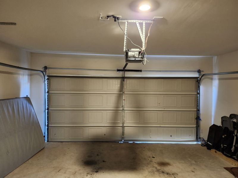 Inside view of a double garage door after an off-track repair in Ferris, TX