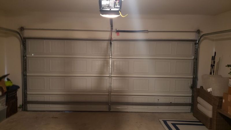 Garage door opener and double door after an opener service in Ferris, TX