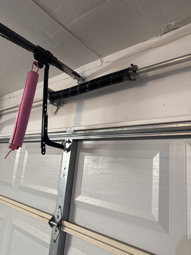 Torsion spring and opener arm after a spring replacement in Forest Hill, TX