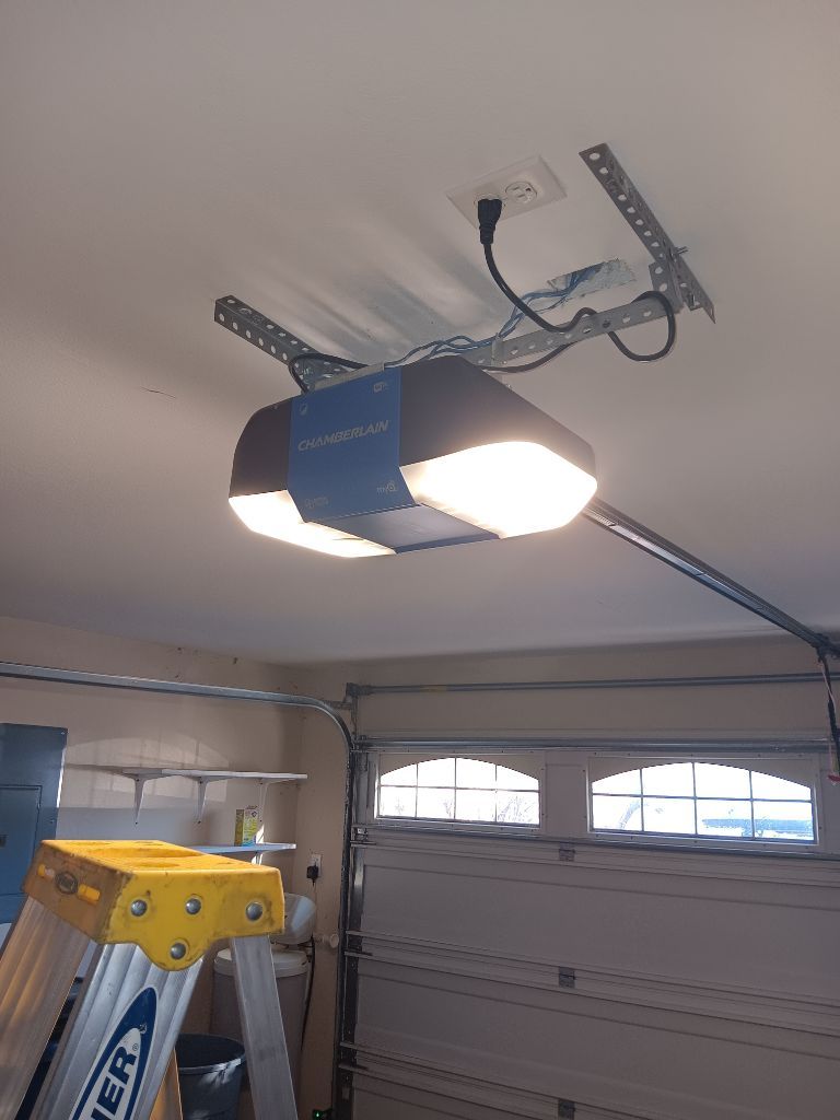 Garage door opener and doors after a safety tune-up in Granbury, TX