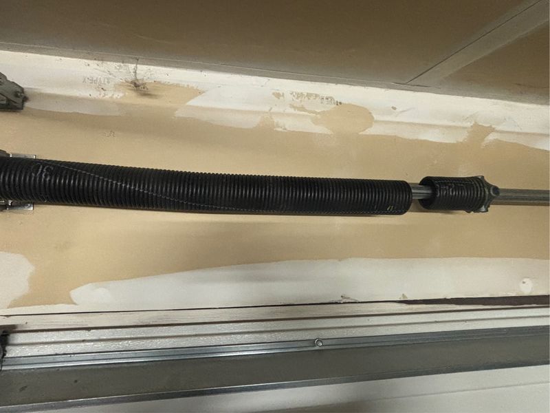 Torsion spring after replacement in Heartland, TX