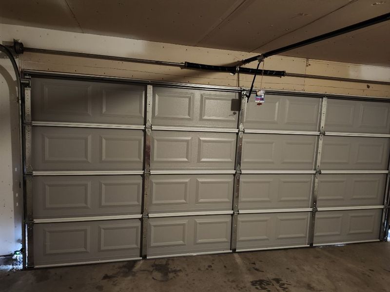 Inside view of a new raised-panel double garage door in Hurst, TX