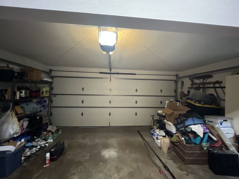 Inside view of a double garage door with a new opener in Lake Highlands, Dallas