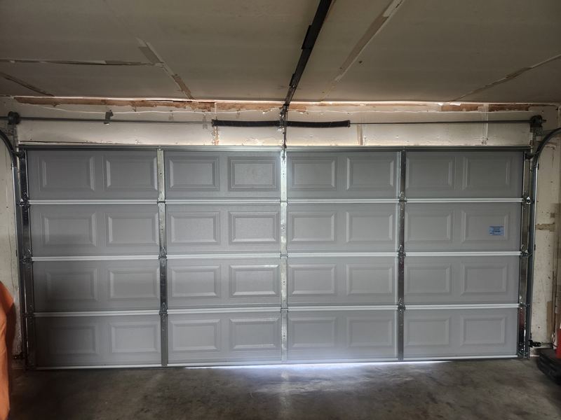 Inside view of a newly installed double garage door in Mesquite, TX