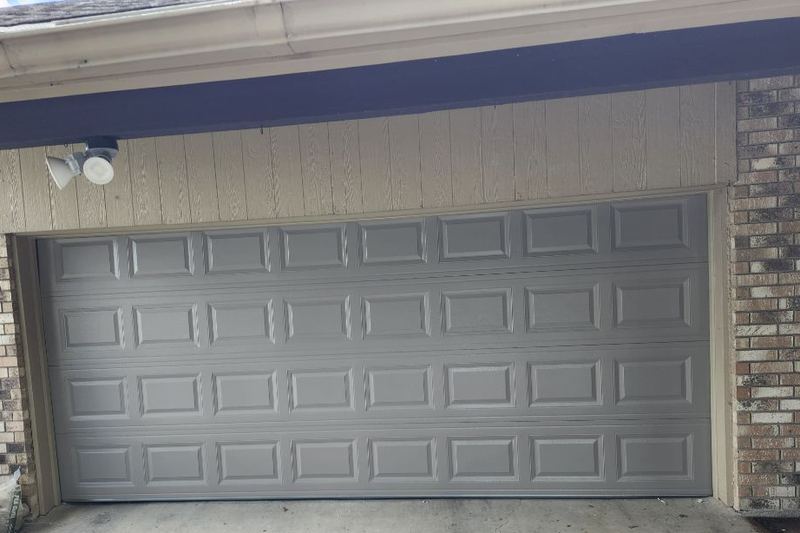 New gray raised-panel double door in Heath, TX