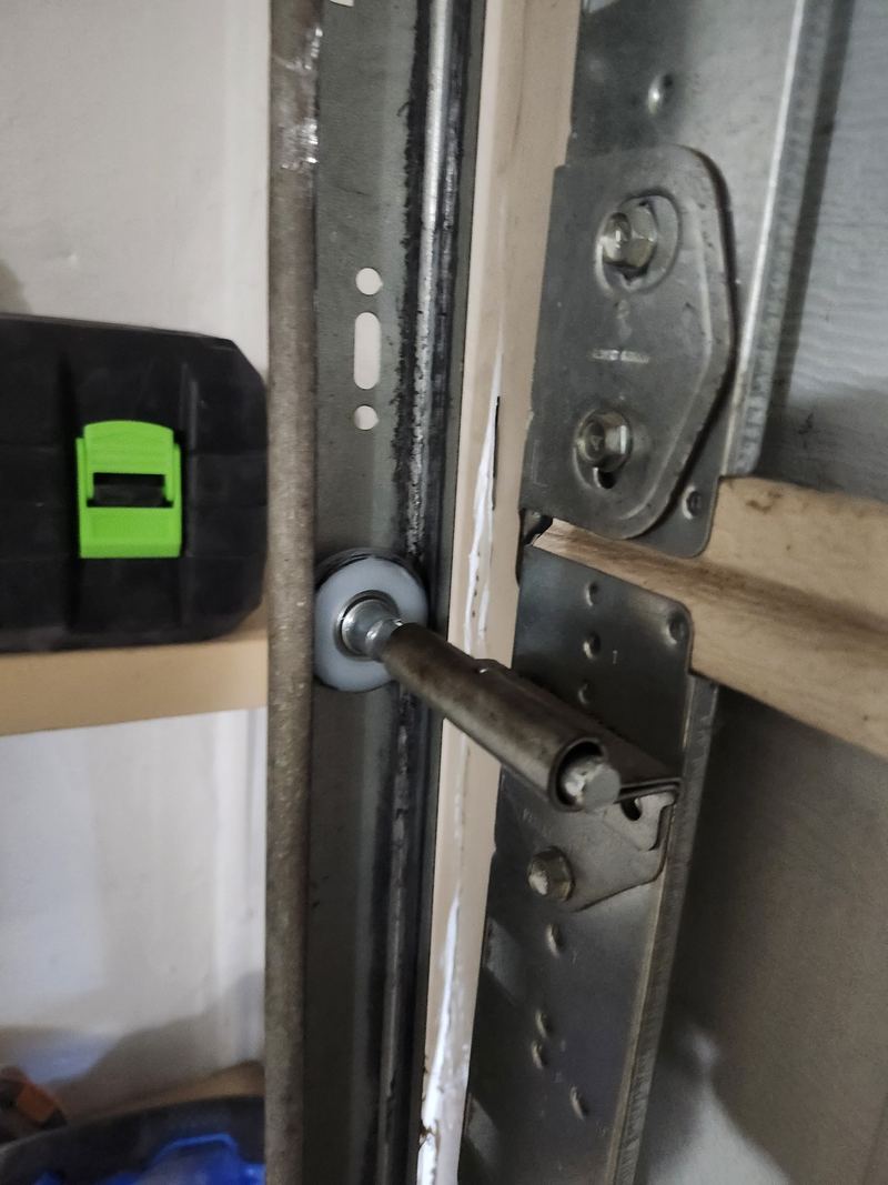 New garage door roller and hinge on a repair in Lewisville, TX