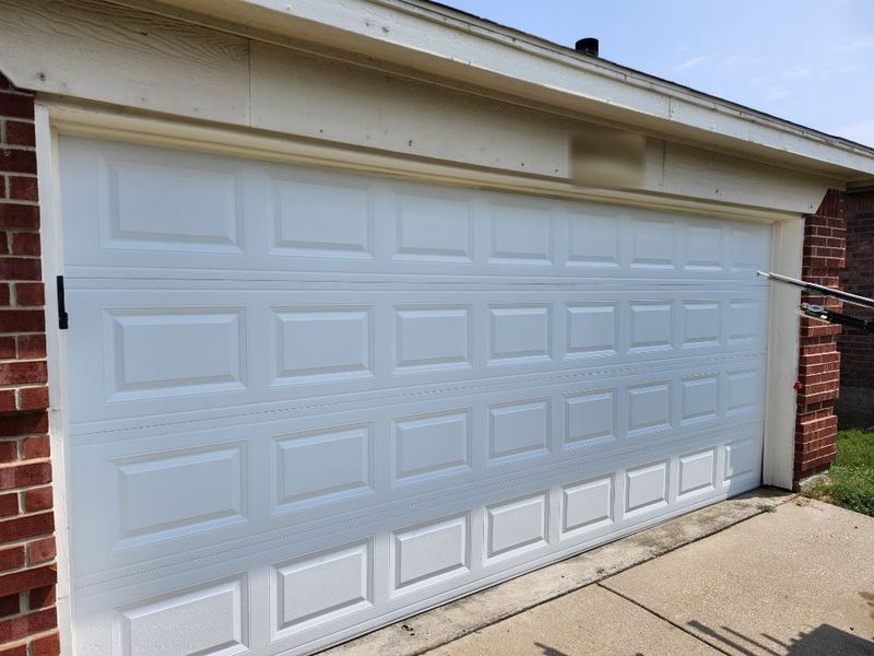 New white raised-panel double door in Hurst, TX