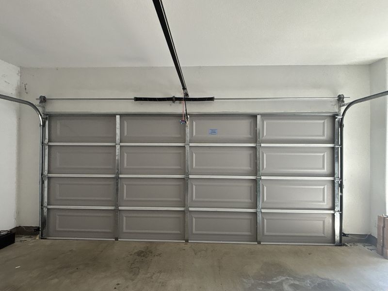 Torsion spring and track checked in Oak Point, TX