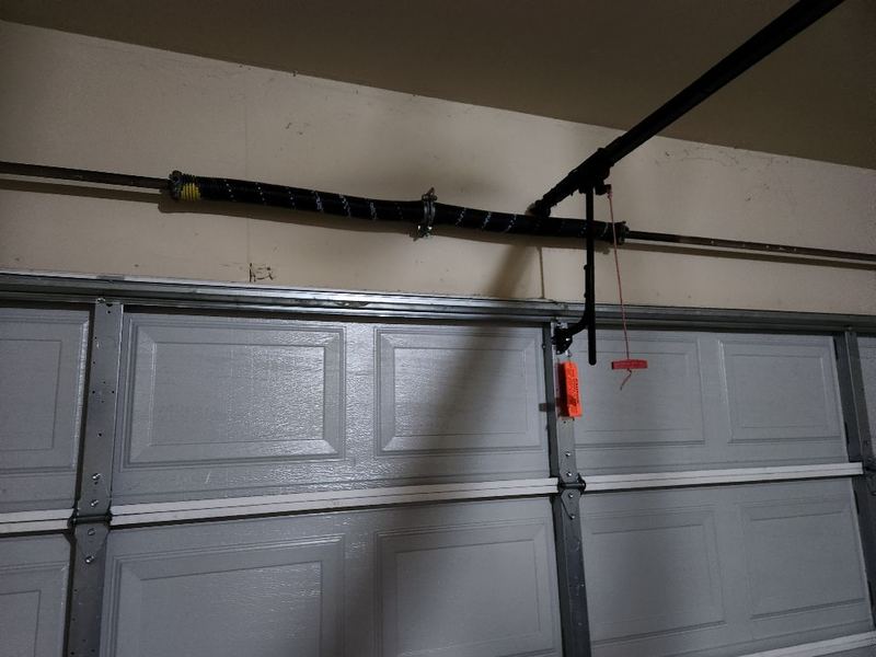 Door back on track after an off-track repair in Rockwall, TX