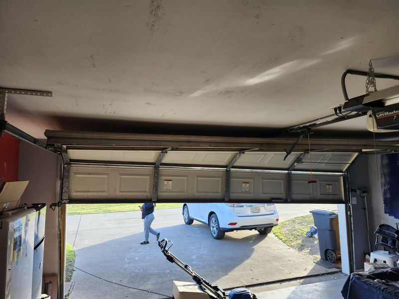 Door and opener after a repair in Palmer, TX