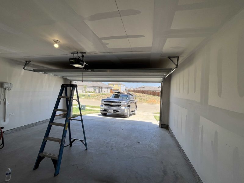 Inside view of a garage door during a service call in Pilot Point, TX