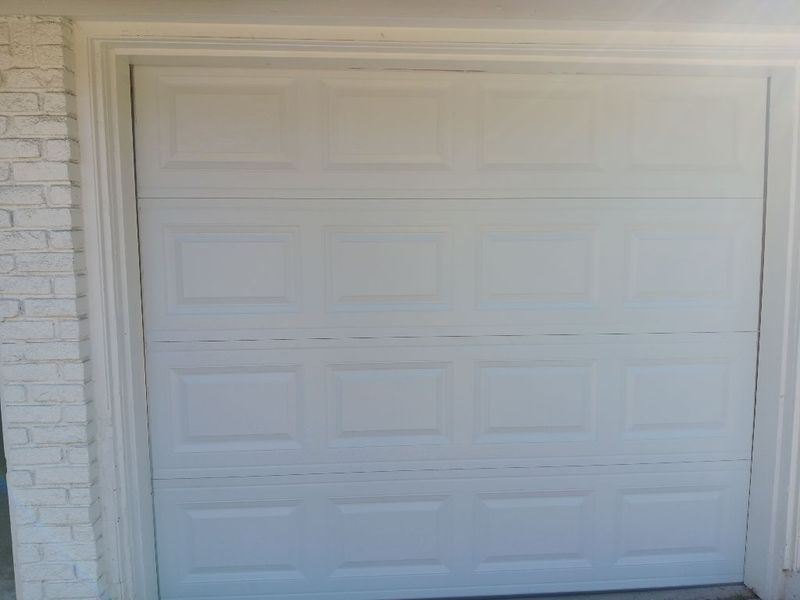 New white raised-panel single door installed in Richland Hills, TX