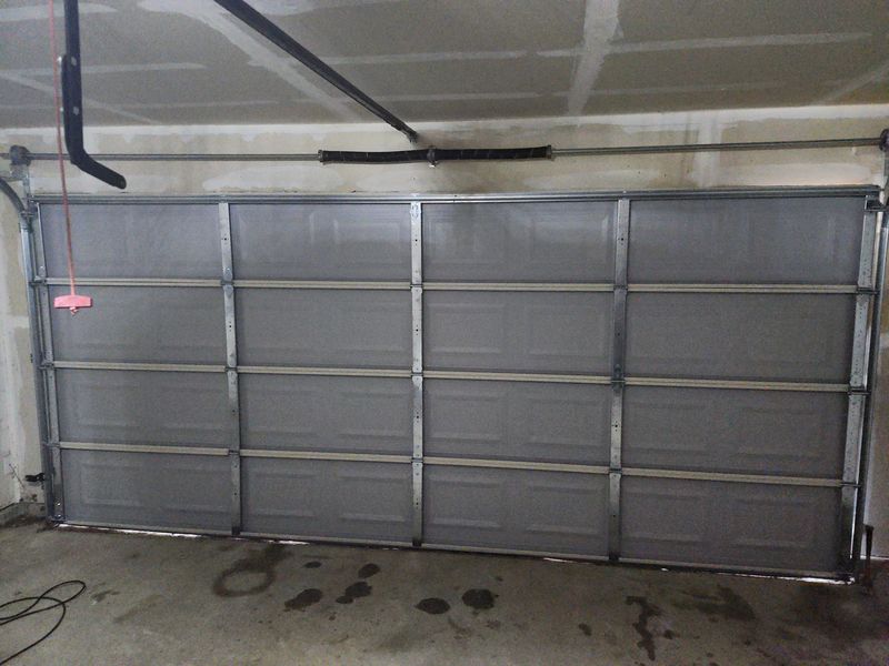 Inside view of a new double garage door with opener in Terrell, TX