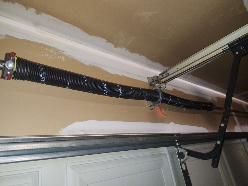 New torsion spring installed during a spring replacement in Dallas, TX