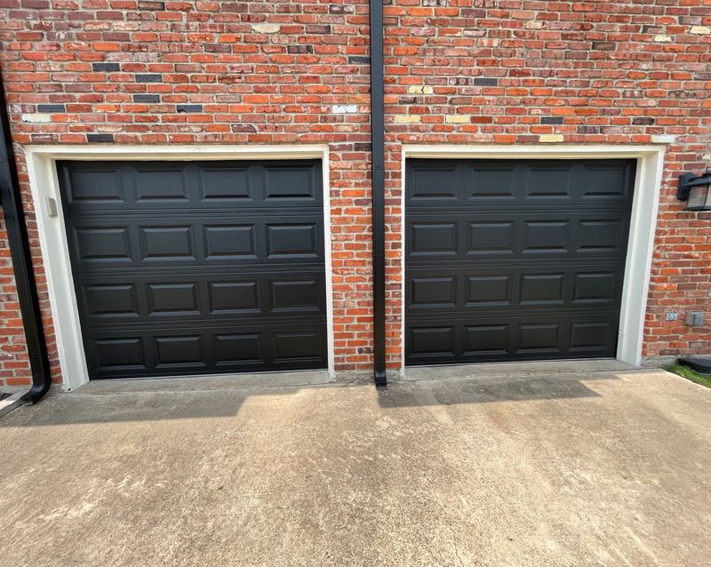 Two new black single-car doors in Rockwall, TX