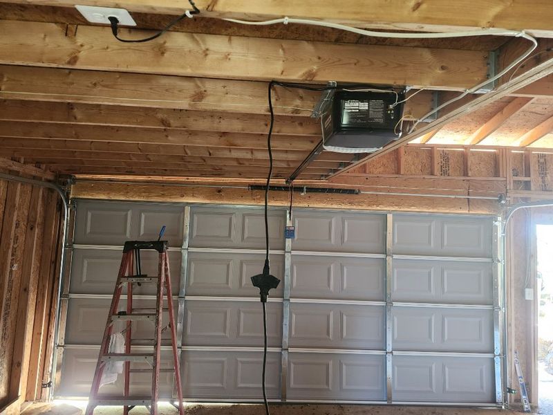 Inside view of a new double garage door with opener in Venus, TX