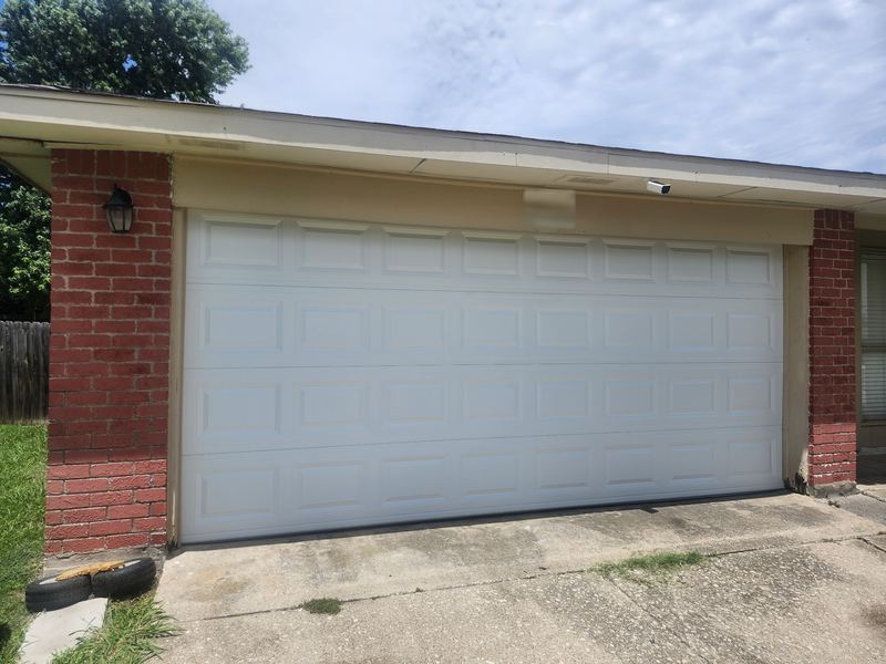 New white double garage door installed in Mesquite, TX